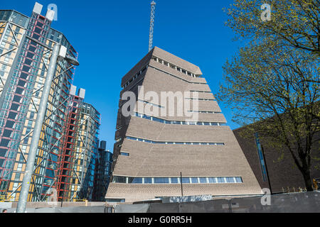 Das äußere der neuen Erweiterung der Tate Modern nähert sich Fertigstellung.  Das Mauerwerk ist vorhanden und das Glas und Interieur sind abgeschlossen. Stockfoto