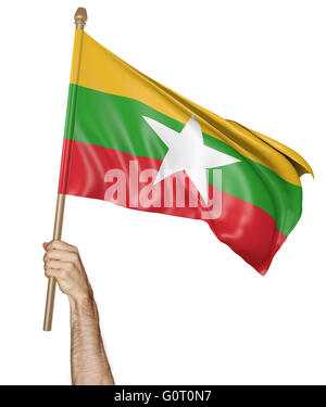 Die Hand stolz schwenkten die Nationalflagge von Myanmar, 3D-Rendering Stockfoto