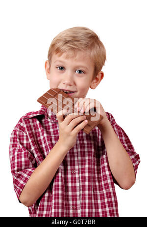 junge isst Schokolade Stockfoto