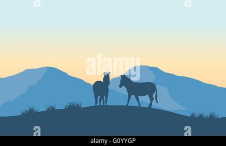 Zwei Zebra-Silhouette auf dem Berg Stock Vektor