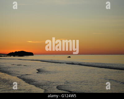 Winter Sonnenuntergang über den Firth of Clyde, Schottland von Girvan Beach, South Ayrshire gesehen Stockfoto