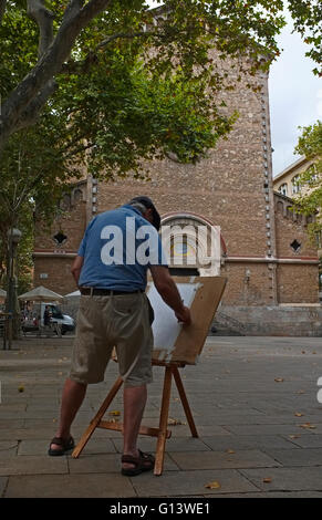 ein Künstler malt in Plaça De La Virreina, Gracia, Barcelona, Spanien Stockfoto