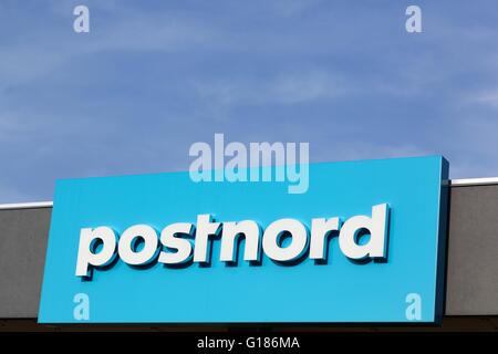 PostNord Logo an der Wand Stockfoto