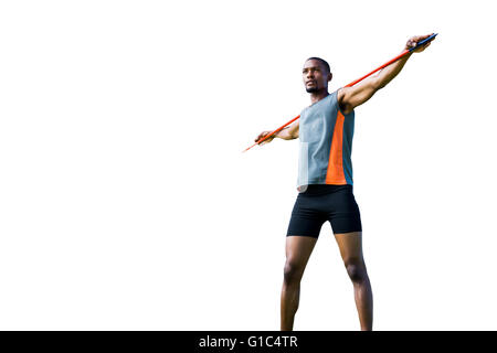 Niedrigen Winkel Blick auf sportlicher Mann hält seinen Speer Stockfoto