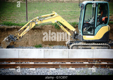 Bagger im Eisenbahn-Werk Stockfoto