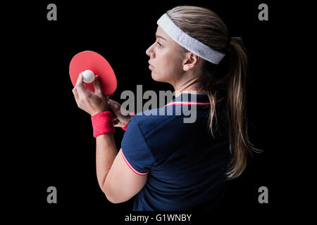 Weibliche Athleten spielen Ping-pong Stockfoto
