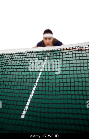 Tennis-Spieler hinter net Stockfoto