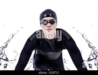 Zusammengesetztes Bild zuversichtlich Schwimmer im Neoprenanzug Stockfoto