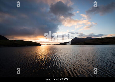 Sonnenuntergang am Loch Assynt in Sutherland Schottland, Vereinigtes Königreich Stockfoto