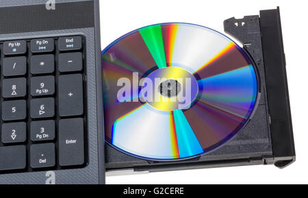 Elektronische Sammlung - Laptop mit offenen DVD-Fach isoliert auf weißem Hintergrund Stockfoto