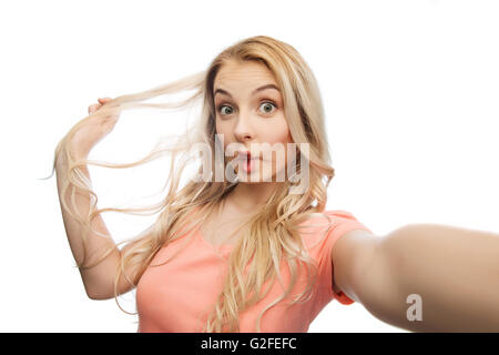 junge Frau nehmen Selfie und machen Fisch Gesicht Stockfoto