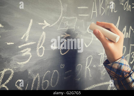 Handschrift am schwarzen Brett Stockfoto