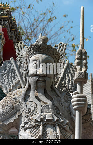 Chinesische Stein Puppe - Gate Gaurdian im Tempel Wat Pho (Wat Po), Bangkok, Thailand Stockfoto