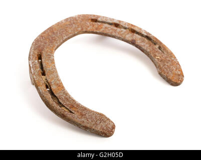 Alte rostige Hufeisen, isoliert auf einem weißen Hintergrund, selektiven Fokus Stockfoto