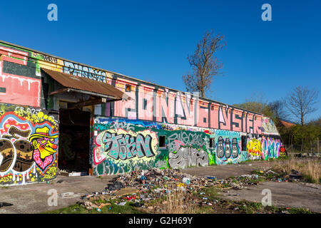 Die alte Mine Depot voller Graffiti in der Nähe der Freien Stadt Christiania das Gebäude für das neue Restaurant Noma, Kopenhagen, Dänemark geworden ist. Stockfoto