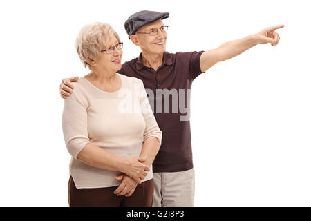 Senior woman zeigen etwas an seine Frau isoliert auf weißem Hintergrund Stockfoto