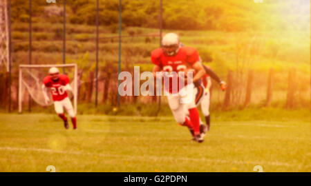 Unscharfen Hintergrund des american-Football-Spiel-Aktion Stockfoto