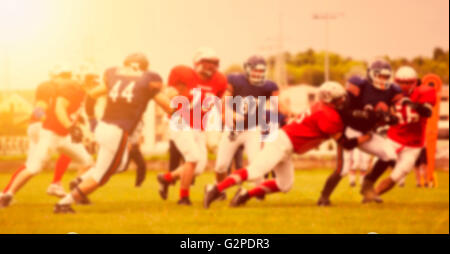 Unscharfen Hintergrund des american-Football-Spiel-Aktion Stockfoto