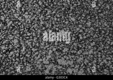 Nahaufnahme des rauen neuen schwarzer Asphalt Textur Stockfoto