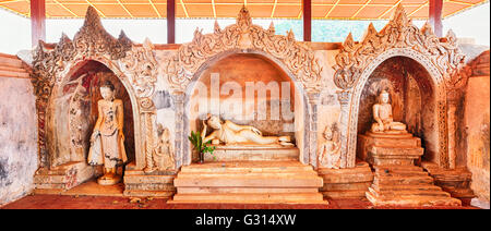 Drei Buddha-Statuen in Takhaung Mwetaw Pagode in Sankar. Myanmar. Stockfoto