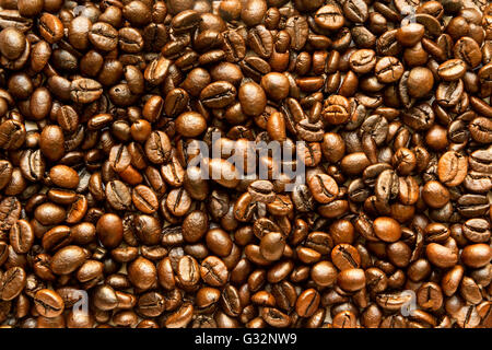 die Textur der Kaffeebohnen geröstet braunen Hintergrund Stockfoto