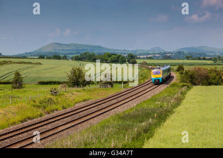 Arriva Trains Wales Dienst auf der Marken-Linie (Cardiff, Manchester) zwischen Craven Arms und Kirche Stretton, Shropshire Stockfoto