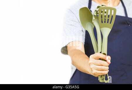 Kochen-Tools In asiatischen Mannes Hand hautnah Stockfoto