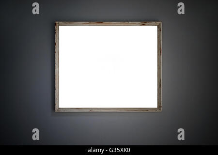leere alte Holzbilderrahmen auf die Betonmauer Stockfoto
