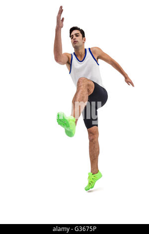 Sportler, die auf weißem Hintergrund Stockfoto