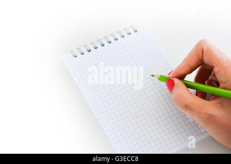 Bleistift und ein Mathe-Notebook auf weißem Hintergrund Stockfoto