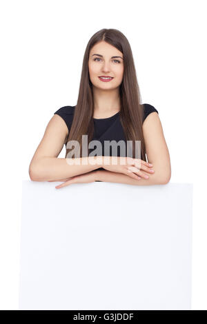 Hübsche Frau mit weißen Blankopapier Stockfoto