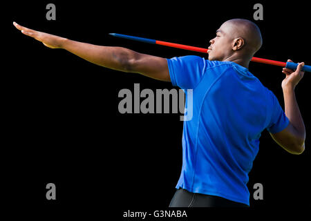 Zusammengesetztes Bild des Höhenplans der Sportler Praktizierenden Speer werfen Stockfoto