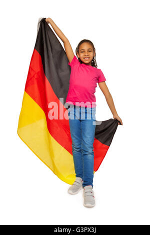 Glücklich Schulmädchen mit großen deutschen banner Stockfoto