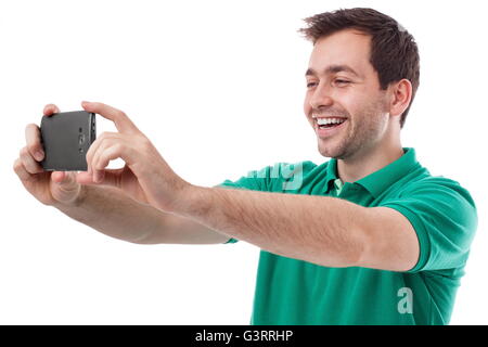 Schönen jungen Mann unter einem Selfie oder oder Chat mit jemandem Stockfoto