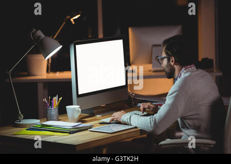 Geschäftsmann mit einem computer Stockfoto