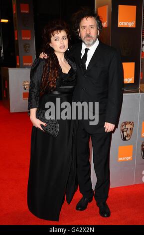 Helena Bonham-Carter und Tim Burton bei der Ankunft bei den Orange British Academy Film Awards 2011 im Royal Opera House, Covent Garden, London. Stockfoto