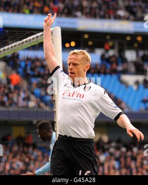 Fußball - Barclays Premier League - Manchester City / Fulham - City of Manchester Stadium. Fulhams Damien Duff feiert das Eröffnungstreffer seines Teams. Stockfoto