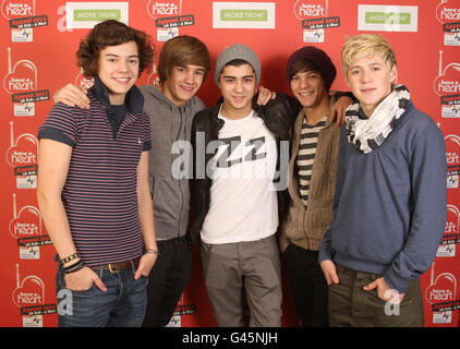 Eine Richtung (von links nach rechts) Harry Styles, Liam Payne, Zayn Malik, Louis Tomlinson, Niall Horan während der 2011 Heart FM haben einen Herzschlag, Geld für Kinderhospizes UK sammeln, in den Heart FM Studios in Leicester Square, Central London. Stockfoto