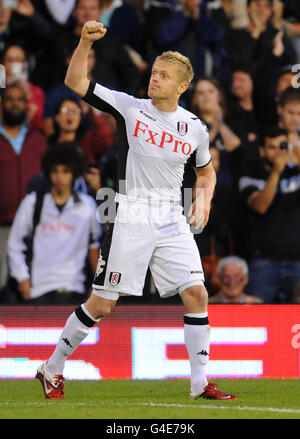 Fußball - UEFA Europa League - zweite Qualifikationsrunde - zweite Etappe - Fulham gegen Crusaders - Craven Cottage. Fulhams Damien Duff feiert sein Tor Stockfoto