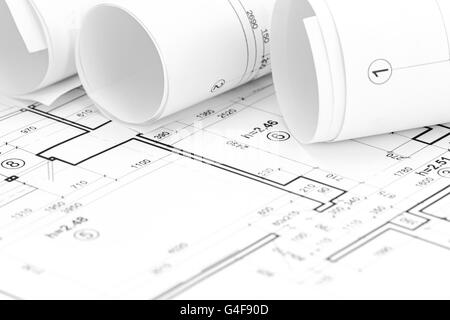 Architekt-Arbeitsbereich mit gerollten Grundrisse und Baupläne Stockfoto