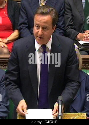 Premierminister David Cameron gibt vor dem Unterhaus in Zentral-London eine Erklärung zu den jüngsten Unruhen um England ab. Stockfoto