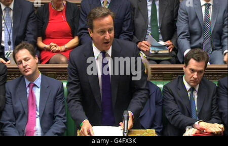 Premierminister David Cameron gibt vor dem Unterhaus in Zentral-London eine Erklärung zu den jüngsten Unruhen um England ab. Stockfoto