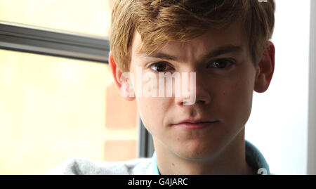 Thomas Sangster, der die Stimme von Ferb in Disney's Phineas und Ferb spielt, im Soho Hotel in London. Stockfoto