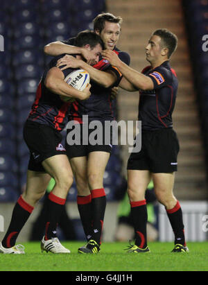 Rugby Union - RaboDirect pro 12 - Edinburgh Rugby gegen Munster Rugby - Murrayfield. Matthew Scott aus Edinburgh feiert seinen ersten Versuch während des RaboDirect pro 12-Spiels in Murrayfield, Edinburgh. Stockfoto