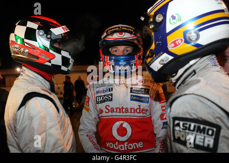 Vodafone McLaren Mercedes Fahrer Jenson Button (Mitte) während des Dan Wheldon Memorial Kart Race in Daytona Milton Keynes, Buckinghamshire. Stockfoto