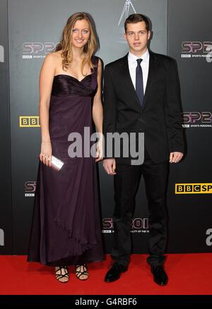 Tennisspielerin Petra Kvitova und Freund Adam Pavlasek kommen für die Sports Personality of the Year Awards 2011, bei MediaCityUK, Salford, Manchester. Stockfoto