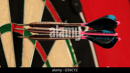 Darts - McCoys Premier League Darts 2012 - Westpoint Arena. Phil Taylors Darts im Brett Stockfoto