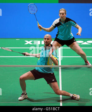 Robert Blair und Jillie Cooper aus Schottland während der Yonex All England Badminton Championships in der National Indoor Arena in Birmingham. Stockfoto