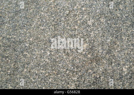 Surface of the wall of gray marble granite with black, gray and white patches. Stockfoto