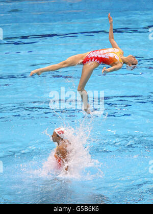 Olympische Spiele In London - Aktivitäten Vor Den Spielen - Mittwoch. Das chinesische Synchronisiertes Schwimmteam übt während der Schwimmtrainingsstunde im Aquatics Center im Olympic Park, London. Stockfoto